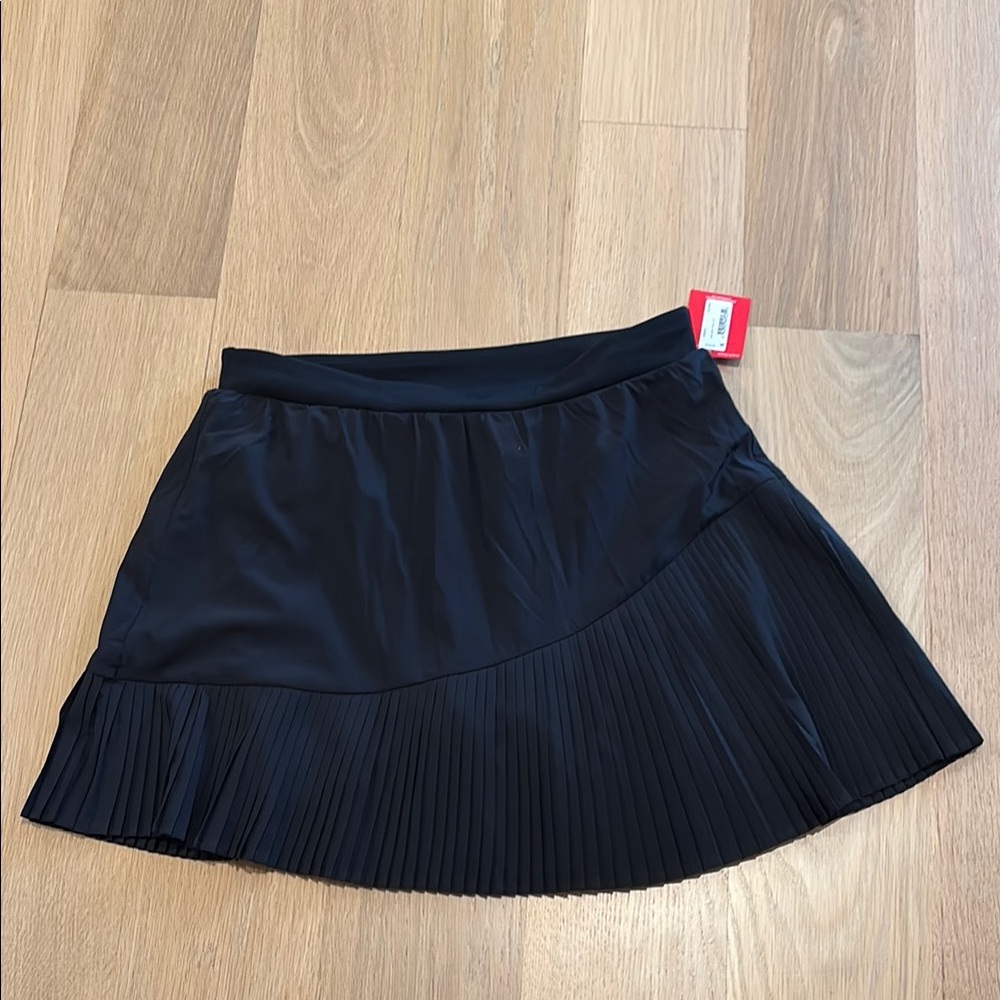 SPANX Black Mini Skirt with Pleats. Medium. New with tags.